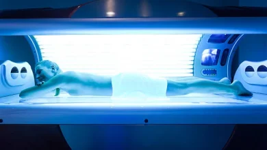 Gas spring for tanning bed